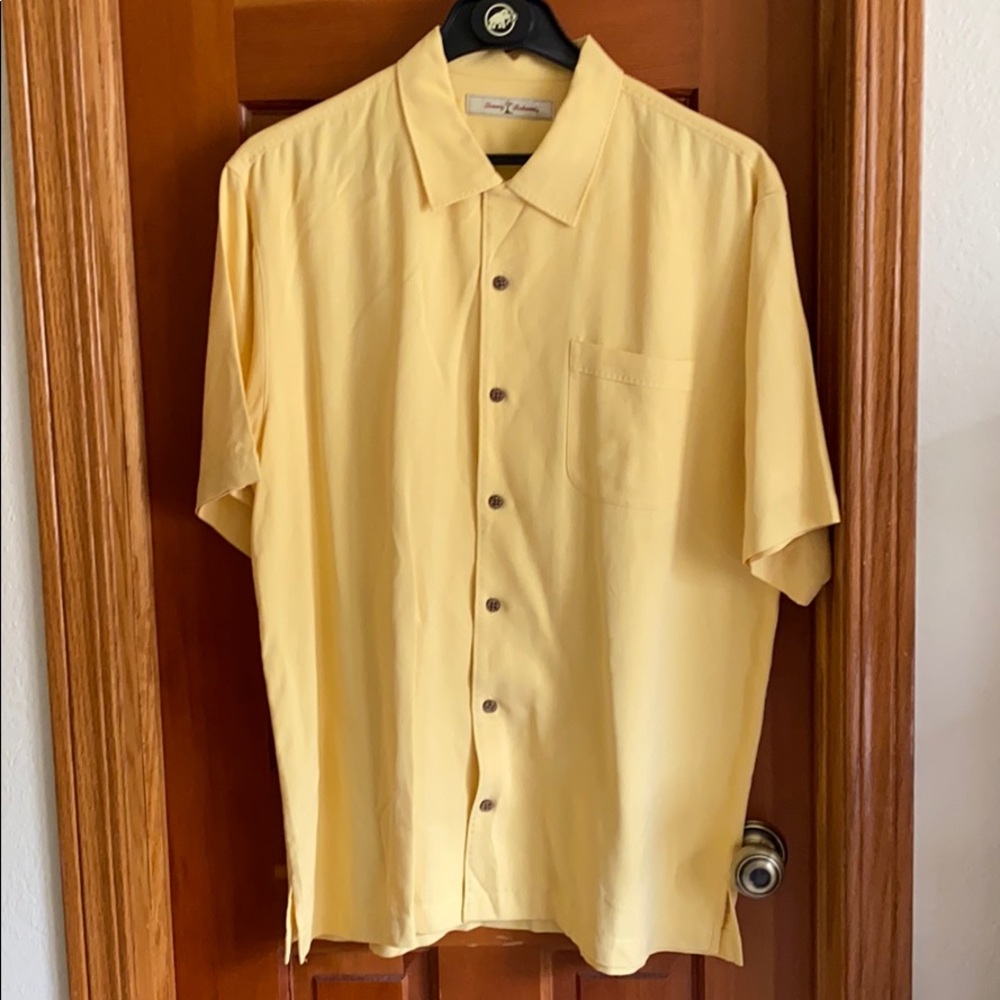 Yellow Tommy Bahama silk button town shirt.